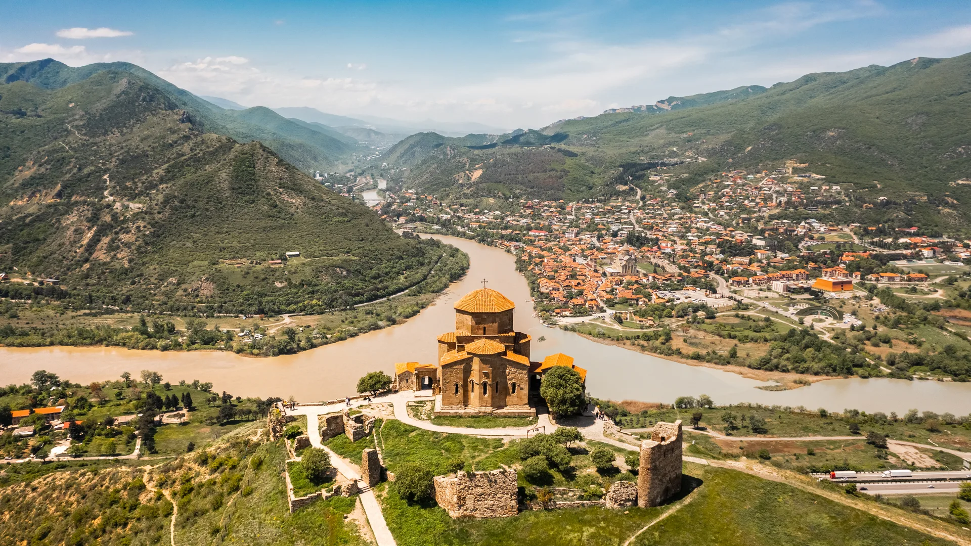 Aerial view of Jvari Monastery perched on a hilltop above the confluence of the Aragvi and Mtkvari rivers in Mtskheta